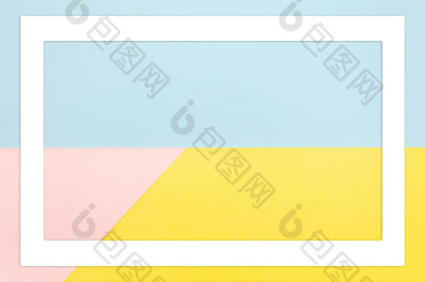 抽象几何图形淡黄色、粉红色和蓝色纸张背景