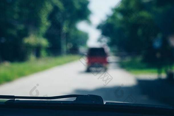 车挡风玻璃刮水器挡风玻璃刮水器焦点视图前面座位车之前散景形式