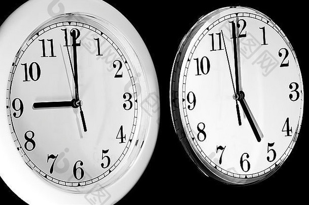 黑白挂钟，黑色背景上显示典型的9到5个工作日