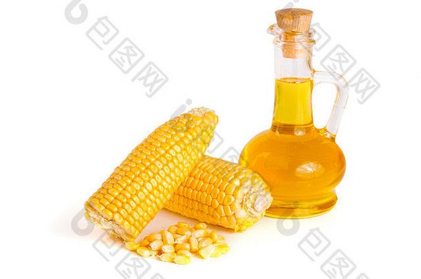 倾析器中的<strong>玉米油</strong>，白色背景上分离的新鲜玉米芯和谷物