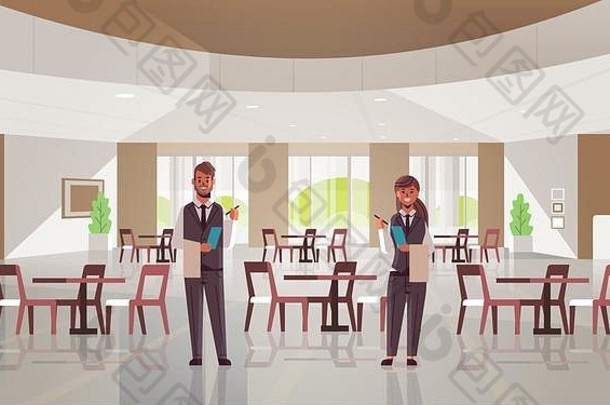 专业服务员夫妇站在一起男女餐厅工作人员穿着制服手持记事本和毛巾接受订单概念现代咖啡馆