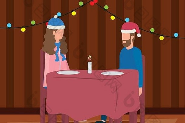 快乐快乐圣诞节夫妇庆祝浪漫的晚餐