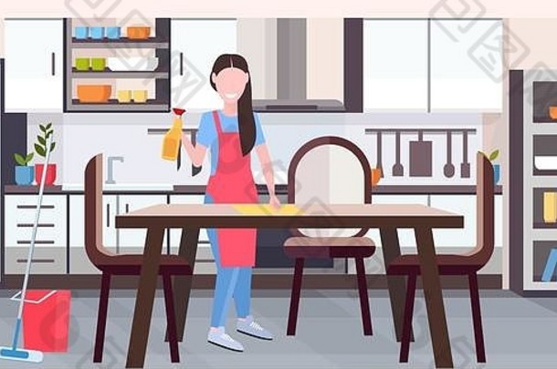 围裙中的家庭主妇用抹布擦拭餐桌由女工做家务清洁服务家政理念全尺寸平面现代厨房