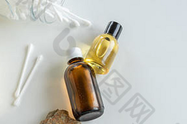 前视图瓶燕麦至关重要的石油健康护理化妆品产品
