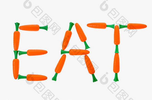 单词eat在白色背景上用胡萝卜拼出来