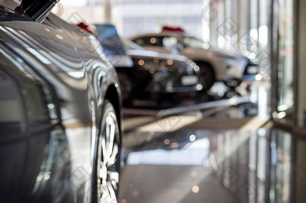 车汽车经销商汽车经销商展厅著名的车辆主题模糊背景散景效果