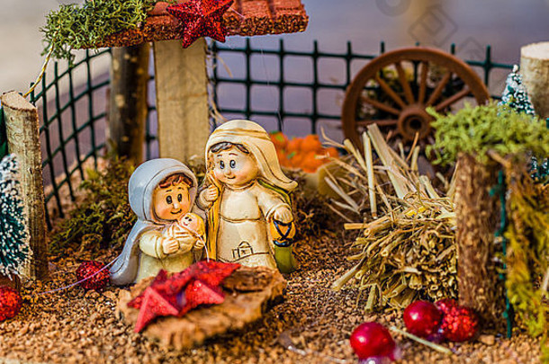 生动的颜色圣诞节基督诞生场景祝福维珍玛丽圣约瑟夫看神圣的孩子耶稣吃