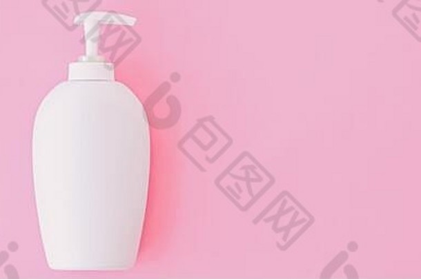 瓶抗菌液体肥皂手洗手液粉红色的背景卫生产品医疗保健平铺