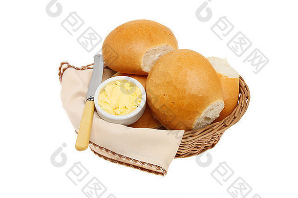 一个易怒的面包卷黄油刀serviette篮子孤立的白色