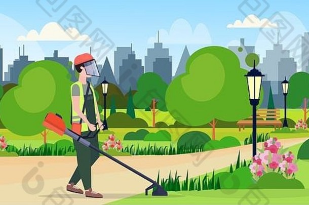 男子园丁用刷子划一割草园艺概念城市公园城市景观背景平面全长水平