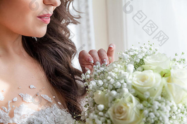 新娘手中的婚礼花束图像