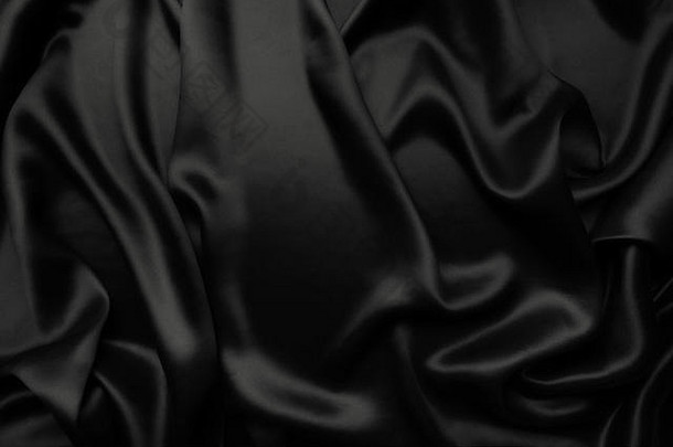 黑色缎面丝绸，优雅的面料作为背景