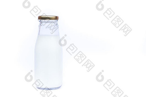传统的玻璃牛奶瓶白色背景股票照片