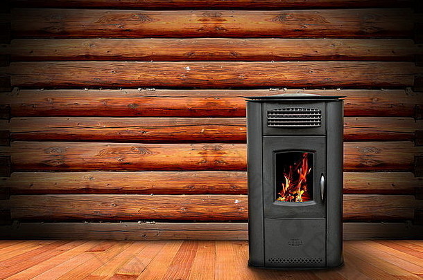 带有木质饰面和燃烧炉的温暖小屋内部