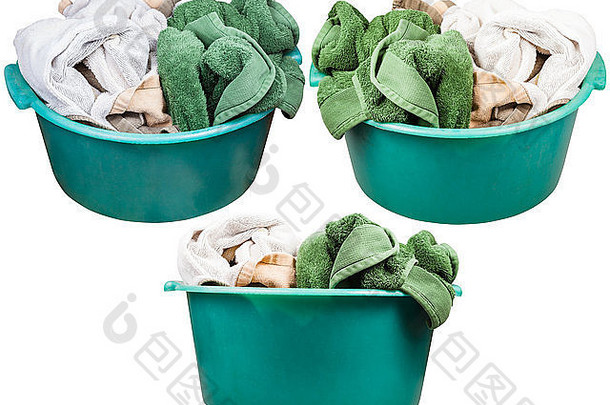 一套圆形绿色塑料洗手盆，白色背景上隔离毛巾