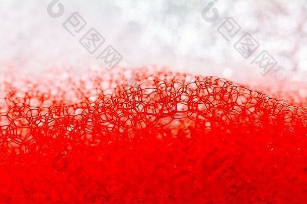 红色背景的肥皂泡沫纹理