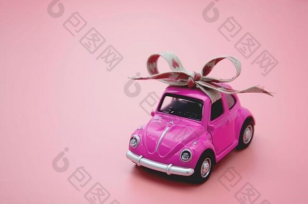 寇比2月微型粉红色的玩具车乡村丝带弓粉红色的背景