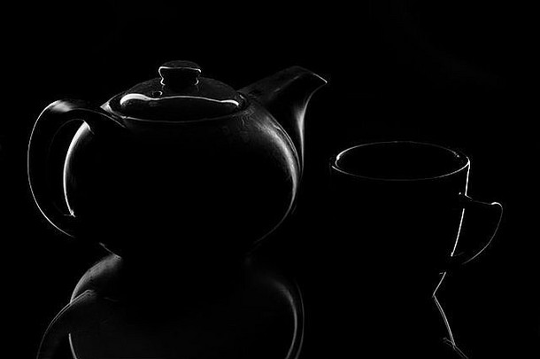 中国人茶壶杯孤立的黑色的dackground