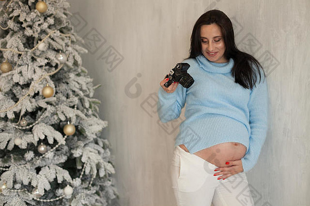 怀孕了女人摄影师拍摄