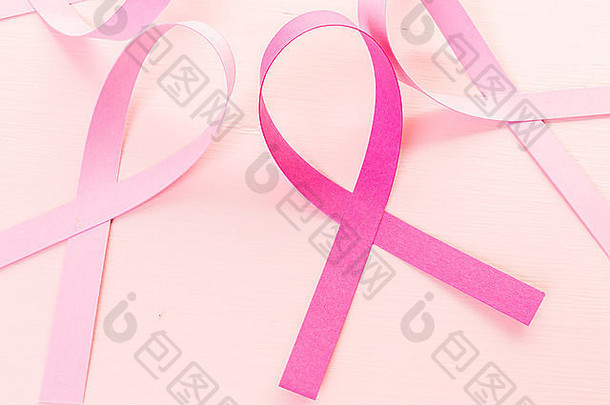 女人的健康象征粉红色的丝带粉红色的背景