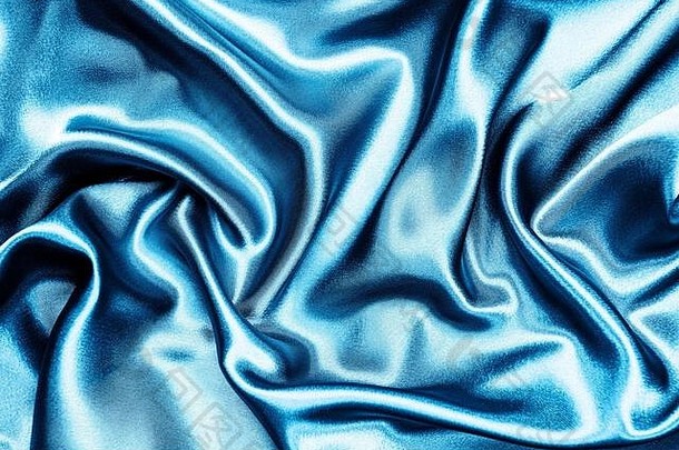 丝绸<strong>布</strong>纹理波健美的时尚的蓝色的颜色经典蓝色的颜色纺织背景