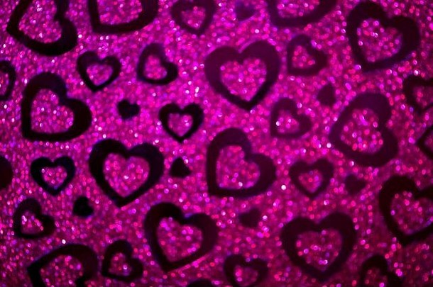 情人节背景：闪闪发光的粉色心形
