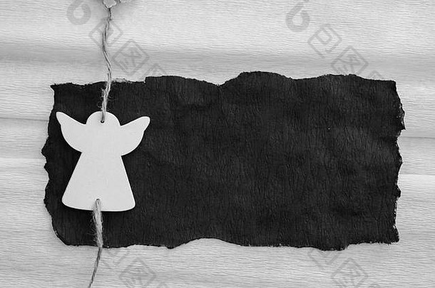 黑白背景上的木制白色星形装饰
