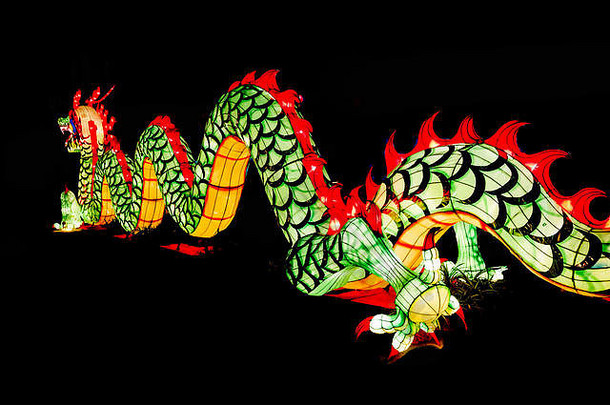 中国人一年装饰,特写色彩斑斓的龙闪闪发光的散景回来背景软模糊