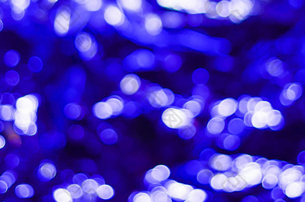 蓝色的节日圣诞节优雅的摘要背景散景灯星星情人节一天发光的摘要黑色的紫色的摘要纹理