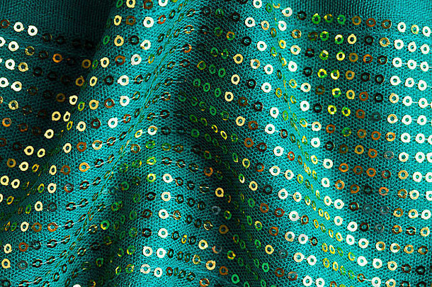 <strong>绿色</strong>闪亮的sequine背景纹理摘要布波浪折叠优雅的亮片闪闪发光的纺织关闭