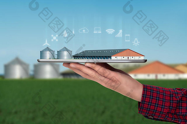 农民持有平板电脑现代聪明的农场可再生能源drones数字转换农业