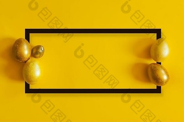 金彩色的复活节鸡蛋黄色的背景视图黑色的边境框架前视图平躺图像复活节节日假期