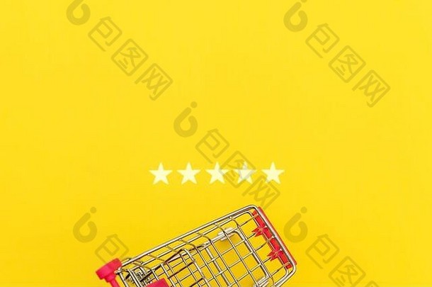 小超市杂货店推车购物玩具轮子星星评级孤立的黄色的背景零售消费者购买在线评估审查概念