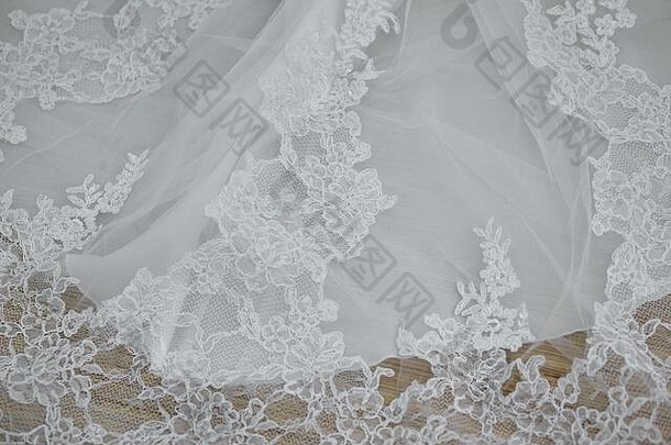 质地、背景、刺绣蕾丝、白色婚纱的精致细节
