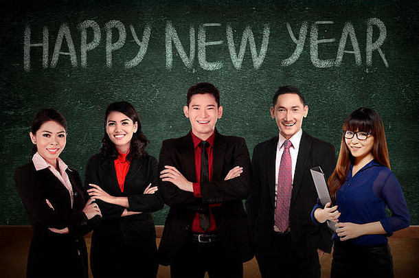 2016年新年快乐写作前的业务团队。新年概念