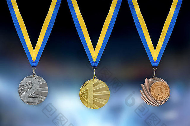 黄金银青铜奖牌前景黄色的蓝色的丝带
