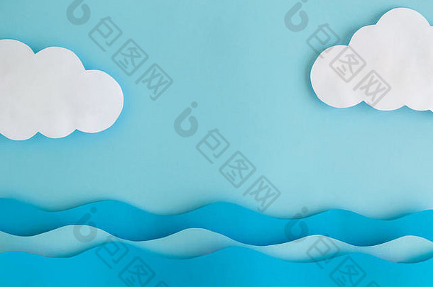 平躺海波云使纸柔和的蓝色的背景空间复制