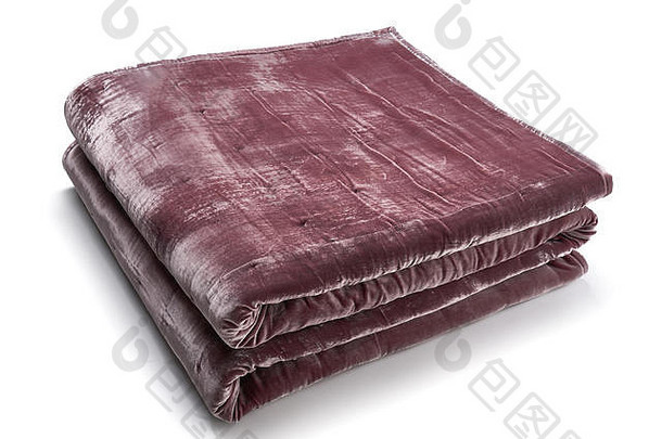 粉红色的毯子使薇洛尔织物整齐折叠孤立的白色背景