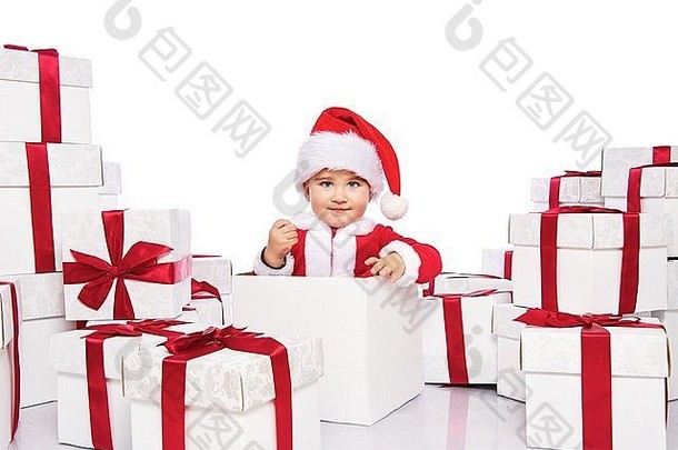 婴儿男孩圣诞老人老人服装坐着内部礼物盒子