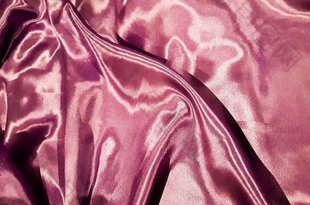 紫罗兰色的织物关闭背景光滑的优雅的丝绸缎纹理背景摘要布料织物织织物背景