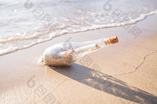 消息瓶沙子海滩日落支持发展