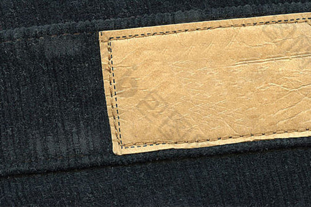 空白皮革标签黑色的牛仔裤