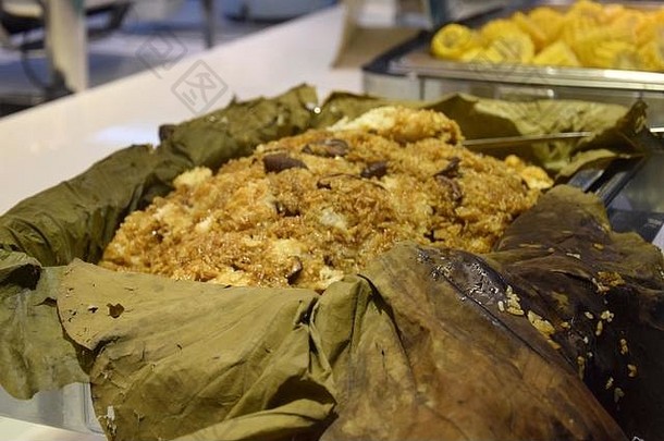 自助餐中国人餐厅粽子传统的中国人大米菜使糯米大米塞馅料包装竹子叶