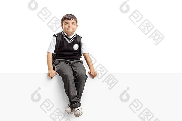 小学生坐着面板相机孤立的白色背景