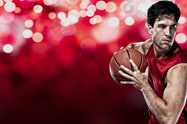 篮球球员红色的统一的红色的灯backgrond