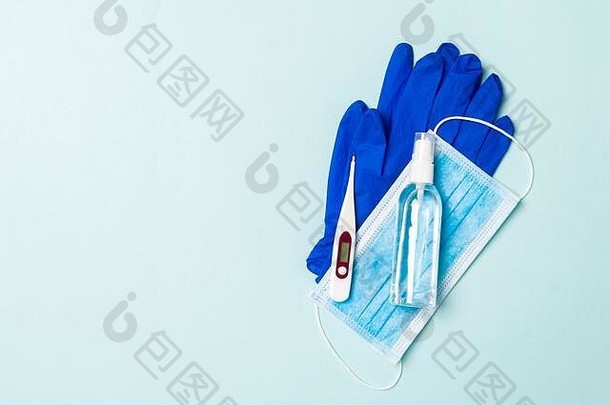 前视图乳胶手套瓶酒精手清理医疗面具数字温度计蓝色的背景抗菌病毒保护