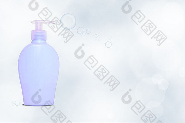 瓶肥皂dispencer泡沫蓝色的Backgorund