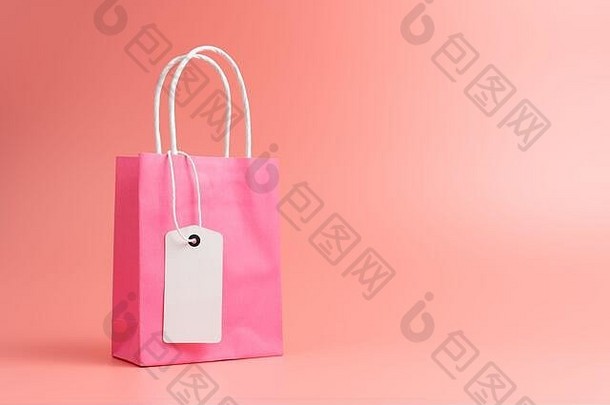 单粉红色的购物礼物袋孤立的粉红色的背景