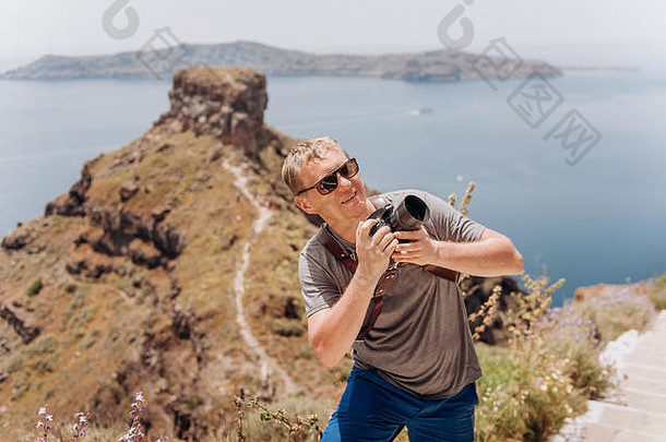 男人。摄影师采取图片圣托里尼岛<strong>希腊</strong>拍摄相机