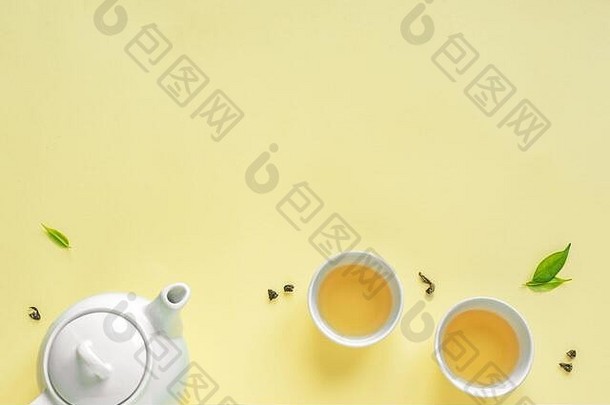 杯茶白色茶壶绿色茶叶子黄色的柔和的背景复制空间茶作文亚洲茶文化有机Herbal